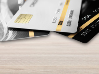 Closeup credit card on wood table.
