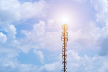 Telecommunication tower with blue sky and white clouds background,satellite pole communication...