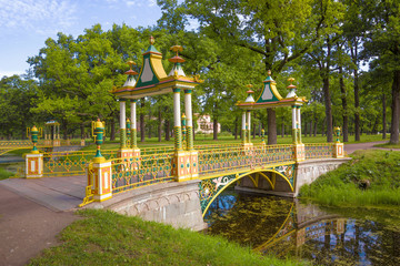 Chinese bridge in the Alexander Park of Tsarskoye Selo on a sunny July morning. Saint-Petersburg,...