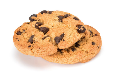 Homemade cookies. Two sweet cookies with chocolate chips. Tasty biscuit in high resolution close-up, isolated on white background with small shadows. Homemade bakery.