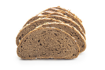 Sliced whole grain bread with oat flakes.
