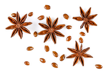 Anise star. Four star anise fruits with seeds. Close up Isolated on white background, flat lay view...