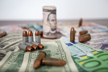 Bullets and money