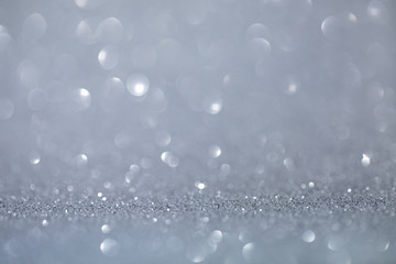 light sparkles blurred bokeh background, snow immitaton