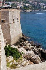 View of City Walls in Old town of Dubrovnik, in summer, at noon