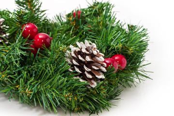 Christmas wreath with branches of artificial Christmas tree close-up