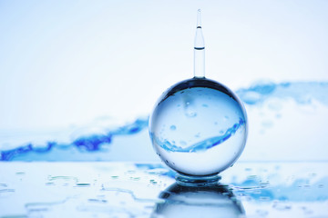 Tools for vision correction. Glasses and lenses with diopters on the background of splashes and...