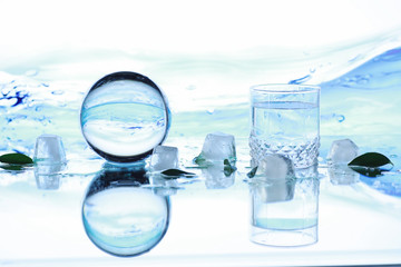 Tools for vision correction. Glasses and lenses with diopters on the background of splashes and...