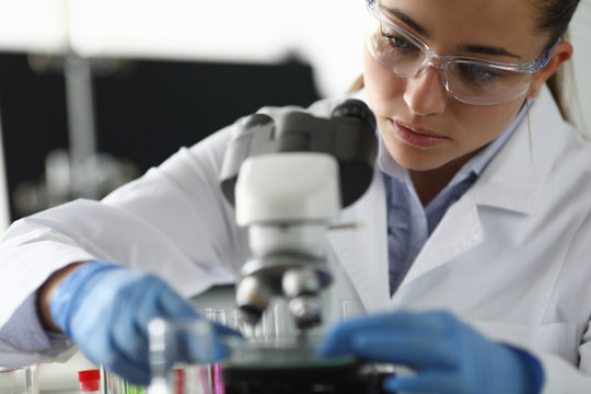 Adult caucasian beauty woman chemist in protective