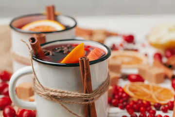 Christmas hot mulled wine in rustic cup close up