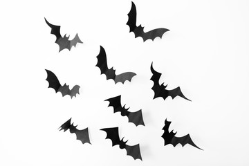 Halloween background.  bats decoration  pattern on white background. Top view of Halloween paper craft black bats. copy space