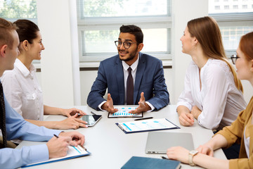 International business team discuss a new project