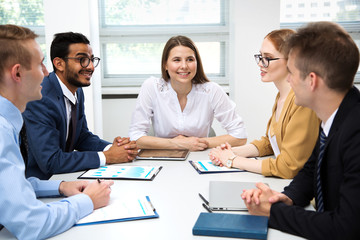 International business team discuss a new project