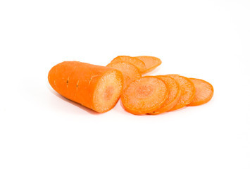 Close up carrot sliced into pieces with reflecting orange shadow on white background.