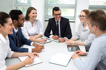 International business team discuss a new project