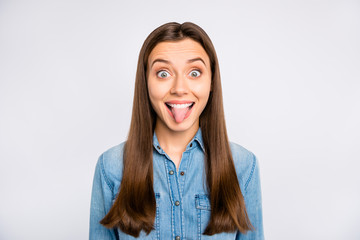 Portrait of excited funky funny feel rejoice on spring weekends show her tongue make friends laugh wear casual style clothing isolated over white color background