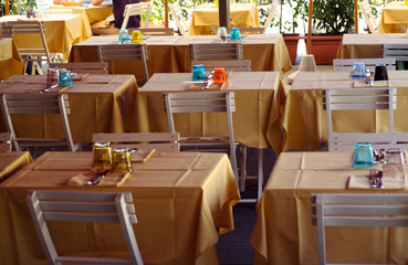 Background of a summer cafe with empty tables