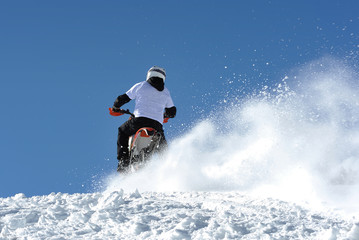 motorcycle snow hill climbing