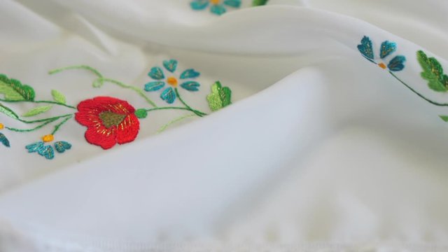 Flower design embroidery on a traditional Sorbian piece of material used for making costumes and dresses for women.