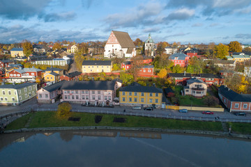 Fototapeta na wymiar Medieval Lutheran Cathedral in the cityscape on a sunny October day (aerial photography). Porvoo, Finland