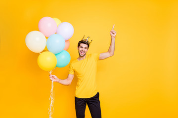 Portrait of his he nice attractive cheerful cheery glad guy wearing crown holding in hands air...
