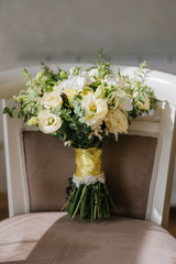 Beautiful wedding bouquet with fresh flowers on a wedding day