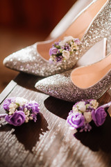 Obraz na płótnie Canvas Brides shoes with decoration on wedding day preparation
