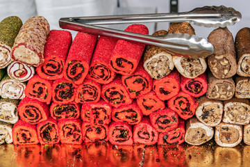 Background with turkish colored homemade sweets in bulk