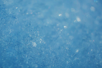 Obraz premium Snow close up. The concept of frost, cooling. Abstract light winter background image. Macro photo.