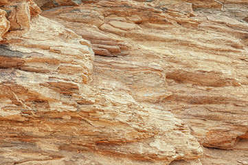 Stone texture. Stone old wall. Granite natural surface. Texture pattern. Natural stone close-up. Structural surface close-up.