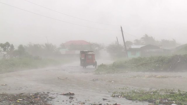 Hurricane Eyewall Strong Wind And Torrential Rain Lash Vehicle - Megi
