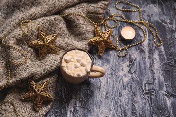 coffee with marshmallows and star shaped christmas toys