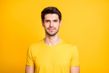 Closeup photo of amazing serious macho guy looking mirror in stylist salon renew hairdo got job promotion wear casual t-shirt isolated yellow color background