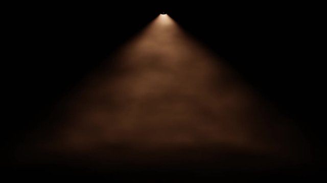 spot light shines through foggy air in front of a black background (seamless loop)