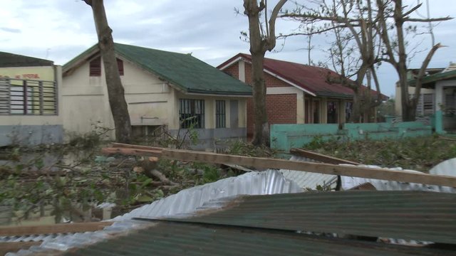 School Heavily Damaged By Powerful Hurricane Wind - Megi