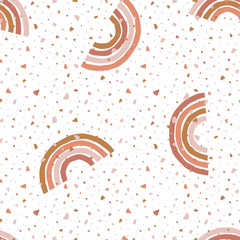 Abstract seamless pattern with terrazzo and simple geometric rainbows. Simple stripy arc bows on terracotta mozaic texture. Childish vector background in Scandinavian style in earth colours palette.