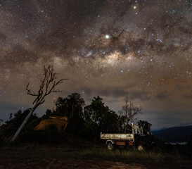The Milky Way Galaxy by Sugud Highlands. Long exposure photograph and contains certain grain or...