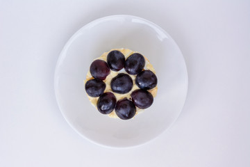 The legendary Tiffany layered salad with grapes, chicken and cheese on the white background.