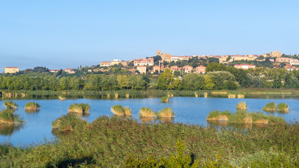 Fototapeta premium Prao de la Paul lake with Laguardia town as background, Rioja Alavesa, Spain