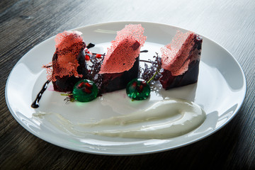 fine dining dessert decorated with pomegranate grains