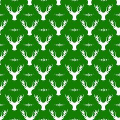 Vector seamless Christmas pattern with white christmas deers on green background; holiday design for greeting card, gift box, wallpaper, fabric, wrapping paper, web design.