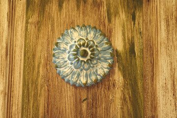 decorative flower on wooden surface