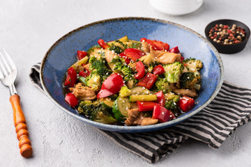 vegetable stire fried on blue plate