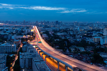Expressway arial view during night with light trail, Bang Na, Bangkok Thailand