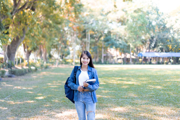 University Education learning abroad international ,Young students asian teenager smile with Note book, school folders reading book at high school university campus college  study learning in summer