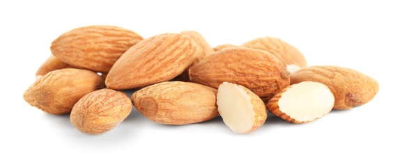 Tasty almonds on white background