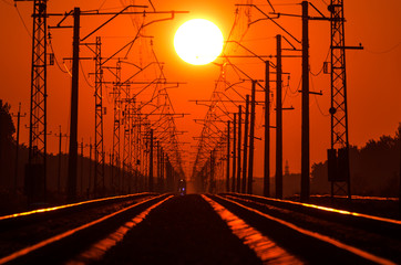 Fototapeta na wymiar red sunset in the wires