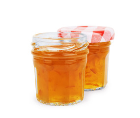Jam in a glass jar on a white background