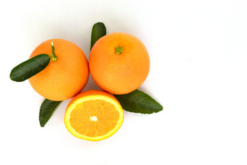 oranges with leaves isolated on white background