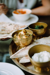 Nepali vegetarian set. Buckwheat bread, vegetable curry, beans and paneer cheese